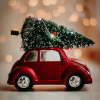 red car christmas ornament with decorated tree on the roof